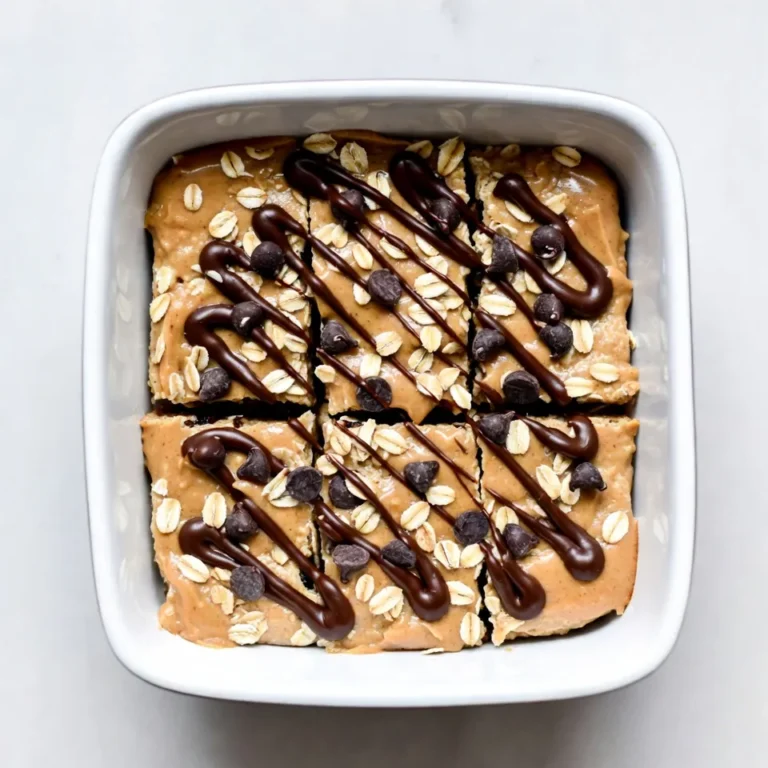 To make No-Bake Peanut Butter Oatmeal Bars, you need simple ingredients. Here’s what you will use: - 2 cups rolled oats - 1 cup natural creamy peanut butter - 1/3 cup honey or maple syrup - 1/2 cup chocolate chips (dark or semi-sweet) - 1/4 cup ground flaxseed (optional) - 1/2 teaspoon vanilla extract - Pinch of salt These ingredients create a sweet and nutty treat. The oats give you fiber, while peanut butter adds protein. Honey or maple syrup sweetens the bars and keeps them moist. Chocolate chips make every bite fun! If you want extra nutrition, use the ground flaxseed. It adds omega-3 fatty acids and fiber without changing the flavor much. Make sure to use natural peanut butter. This type has no added sugar or oils, making the bars healthier. The vanilla extract adds a nice touch, while the salt brings out all the flavors. Each ingredient plays an important role in making this easy and tasty treat. {{ingredient_image_2}} - Combine 2 cups of rolled oats, 1/4 cup of ground flaxseed, and a pinch of salt in a large bowl. - Stir well with a spoon or spatula until everything is well mixed. - In a small saucepan, heat 1 cup of natural creamy peanut butter and 1/3 cup of honey over low heat. - Stir until the mixture is smooth. Then, add 1/2 teaspoon of vanilla extract and mix well. - Pour the warm peanut butter mixture over the oat base. - Mix thoroughly with a spatula, coating all the oats. Then, gently fold in 1/2 cup of chocolate chips. - Prepare an 8x8-inch baking dish by lining it with parchment paper. - Press the mixture firmly into the dish with your hands or a spatula. - Refrigerate for 2 hours to set. Once firm, lift the bars out and cut into 12 equal pieces. To make your bars hold together well, you must compact the mixture tightly. When you press it down in the baking dish, use your hands or a spatula to ensure it's even and firm. This step keeps the bars from falling apart when you cut them. After they set, store them in an airtight container. This keeps them fresh and chewy for a week. For a fun twist, drizzle melted chocolate over the bars before serving. This adds a rich touch that everyone loves. You can also sprinkle extra oats or crushed nuts on top. This not only makes them look nicer but also adds a crunchy texture. If you want a different sweetener, try using maple syrup instead of honey. This option is great for a vegan version. For those with nut allergies, use sunflower seed butter instead of peanut butter. It gives a similar taste and texture without the nuts. Pro Tips Chill for Better Texture: Allow the bars to chill in the refrigerator for at least two hours. This helps them set properly, resulting in a firmer, more enjoyable texture. Nut Butter Variations: Experiment with different nut butters such as almond or cashew for a unique flavor twist. Just ensure they are creamy for the best consistency. Add More Nutrition: Incorporate seeds like chia or sunflower seeds along with the flaxseed for added crunch and a boost in nutrients. Customize Your Sweetness: Adjust the amount of honey or maple syrup to suit your taste. You can also use a sugar substitute if you're looking for a lower-calorie option. {{image_4}} You can change up your bars by adding nuts. Try almonds or walnuts for a crunchy bite. Mix in different nut butters too. A blend of peanut and almond butter tastes great together. This adds flavor and texture while giving you more nutrition. Dried fruits make a tasty addition. You can use raisins, cranberries, or coconut flakes. A half cup of dried fruit works well. Mix and match to find your favorite combo. This adds sweetness and a fun chewiness to each bite. Want a protein boost? Add a scoop of protein powder to the mix. This helps make the bars more filling. You can also replace some oats with seeds like chia or hemp. These seeds pack a punch of protein and healthy fats. To keep your no-bake peanut butter oatmeal bars fresh, use an airtight container. Glass or plastic containers work well. Make sure the bars cool completely before sealing them up. Store the bars in the fridge. This keeps them chewy and tasty. These bars last about one week in the fridge. For long-term storage, you can freeze them. Wrap each bar tightly in plastic wrap, then place them in a freezer bag. They can stay fresh for up to three months in the freezer. Just thaw them in the fridge before eating. Check for any off smells or changes in color. If the bars feel dry or crumbly, they may have gone bad. When in doubt, it's best to toss them. Always follow safe food practices and enjoy your treats fresh! Yes, you can easily make these bars vegan. Simply replace the honey with maple syrup. Both ingredients provide sweetness. The texture will remain similar, and the taste will still be great. These bars last about one week in the fridge. Keep them in an airtight container to maintain freshness. If you want to store them longer, you can freeze them for up to three months. Just thaw them in the fridge before eating. You can use old-fashioned oats, but the texture will change. Old-fashioned oats are thicker and chewier. This may make the bars less soft. If you prefer a firmer bite, then they are a great option. Yes, these bars can be gluten-free. Ensure you use certified gluten-free oats. Regular oats may be processed in facilities with gluten. This can lead to cross-contamination, so always check the label. Adding protein powder is a good idea. You can mix in about a scoop. This will help boost the protein level without changing the taste much. Just make sure you adjust the liquid slightly, as protein powder can absorb moisture. These no-bake bars are easy, tasty, and healthy. We started with the basic ingredients, like oats and peanut butter, then mixed and pressed them together. I shared tips for the best texture and storage. You can even try fun variations like adding nuts or dried fruit. Remember to check for spoilage! These bars are perfect for snacks or a quick breakfast. Get creative with your ingredients and enjoy the process!