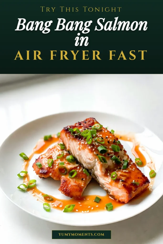 Discover the ultimate Air Fryer Salmon Recipe with this easy Bang Bang Salmon that combines flavor and health! This healthy salmon dish features a creamy bang bang sauce made with Greek yogurt, sweet chili, and sriracha, perfect for a quick dinner. Ready in just 25 minutes, it's an ideal choice for busy weeknights. Don't miss out&mdash;save this recipe for your next easy salmon dinner! #AirFryerRecipes #HealthyEating #SalmonLovers #QuickDinnerIdeas