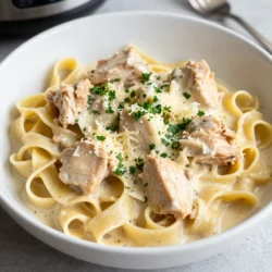 For the perfect Instant Pot Chicken Alfredo, you will need: - 1 lb chicken breast, diced into 1-inch cubes - 2 tablespoons extra virgin olive oil - 3 cloves of garlic, finely minced - 4 cups low-sodium chicken broth - 1 cup heavy whipping cream - 8 oz fettuccine pasta - 1 cup freshly grated Parmesan cheese - 1 teaspoon Italian seasoning blend - Sea salt and freshly cracked black pepper, to taste - Fresh parsley, finely chopped (for garnish) These ingredients blend together to create a rich and creamy dish. While the dish is tasty on its own, you can elevate it with some garnishes: - Extra grated Parmesan cheese - A sprinkle of crushed red pepper for heat - Lemon zest for brightness - Sliced green onions for a fresh touch These garnishes add flavor and visual appeal to your meal. If you don&rsquo;t have an ingredient, here are some substitutes: - Chicken breast: Use chicken thighs for a juicier option. - Olive oil: Vegetable oil or butter can work as well. - Heavy cream: Substitute with half-and-half or coconut cream for a lighter version. - Fettuccine: Any pasta shape like penne or rotini can be used. These substitutions allow you to customize the recipe to fit your pantry. {{ingredient_image_2}} 1. Dice the Chicken: Start with 1 lb of chicken breast. Cut it into 1-inch cubes. This size helps the chicken cook evenly. 2. Minced Garlic: Take 3 cloves of garlic and finely mince them. Fresh garlic adds a strong flavor. 3. Season the Chicken: Use sea salt and black pepper to season the chicken. This step adds depth to your dish. 1. Saut&eacute; Mode: Set your Instant Pot to the Saut&eacute; mode. Add 2 tablespoons of olive oil and let it heat for about 1 minute. 2. Brown the Chicken: Add the seasoned chicken to the hot oil. Cook for about 5 minutes until it's golden brown on all sides. This step gives great flavor. 3. Add Garlic: Stir in the minced garlic. Saut&eacute; for about 1-2 minutes until it smells good but doesn't burn. 4. Deglaze the Pot: Pour in 4 cups of chicken broth. Use a wooden spoon to scrape any bits stuck to the pot. This adds flavor to your sauce. 5. Add Fettuccine: Place 8 oz of fettuccine pasta in the pot. Make sure it is fully submerged in the broth. Do not stir yet to avoid clumping. 6. Pressure Cook: Press the Cancel button to stop saut&eacute;ing. Close the lid and set the steam valve to sealing. Choose the Manual or Pressure Cook setting for 8 minutes. 7. Quick Release: Once the time is up, turn the valve to venting for a quick release. Carefully open the lid once all the steam is gone. 8. Mix in Cream and Cheese: Stir in 1 cup of heavy cream, 1 cup of Parmesan cheese, and 1 teaspoon of Italian seasoning. Mix until the cheese melts and the sauce is creamy. 9. Taste and Adjust: Taste your Alfredo. Add more salt and pepper if needed. Let it sit on Keep Warm for about 5 minutes to thicken. - Creaminess: Use heavy cream for the best texture. It adds richness. - Timing: Let the dish rest for a few minutes after cooking. This helps it thicken nicely. - Stir Gently: When mixing in the cheese, stir gently. This keeps the sauce smooth and creamy. To boost flavor in your Instant Pot Chicken Alfredo, start with quality ingredients. Use fresh garlic for a strong taste. Season your chicken well with salt and pepper before cooking. This makes a big difference. Adding some red pepper flakes can give a nice kick. You can also mix in fresh herbs like basil or thyme for extra depth. If you want more cheese flavor, use a mix of Parmesan and Pecorino Romano. You can prep this dish ahead of time. Cut the chicken into cubes and store it in the fridge. Mix the dry seasonings and store them in a small container. This way, you save time during cooking. You can also cook the pasta and store it separately. Just remember to keep the sauce separate. When ready to eat, heat the sauce and combine everything. It makes for an easy dinner on a busy night. Avoid overcooking the chicken. Saut&eacute; it just until golden brown. If you cook it too long, it can become dry. Don&rsquo;t skip the deglazing step after saut&eacute;ing the chicken. This adds great flavor and prevents burning. When adding pasta, don&rsquo;t stir it right away. This helps keep the pasta from clumping together. Finally, remember to taste your dish before serving. Adjust salt and pepper as needed. These tips will help ensure your Alfredo is creamy and delicious! Pro Tips Use Fresh Ingredients: Always opt for fresh chicken and high-quality Parmesan cheese to enhance the flavor of your Alfredo sauce. Deglaze Properly: Make sure to scrape the bottom of the pot while adding the broth to capture all those delicious browned bits for added flavor. Adjust Consistency: If the sauce is too thick after adding the cream and cheese, feel free to stir in a bit more chicken broth to achieve your desired creaminess. Garnish with Style: For an elegant presentation, add a sprinkle of freshly cracked black pepper and a few additional parsley leaves on top before serving. {{image_4}} You can make this dish even better by adding veggies. Try spinach, broccoli, or bell peppers. Simply chop them into small pieces. Add them to the pot when you add the garlic. The veggies will cook quickly and add great flavor and color. Fettuccine is a classic choice, but you can switch it up. Penne or rotini work well too. If you want a healthier option, use whole wheat or gluten-free pasta. Just remember to adjust the cooking time based on the pasta type you choose. Check the package for best results. Chicken is great, but you can use other proteins too. Shrimp or diced turkey are fantastic swaps. For a vegetarian option, try chickpeas or tofu. If you pick a different protein, adjust the cooking time as needed. This way, you keep the dish quick and creamy! To keep your Instant Pot Chicken Alfredo fresh, use airtight containers. Make sure to let the dish cool before sealing. This helps avoid excess moisture and keeps it creamy. Store leftovers in the fridge for up to three days. When you reheat, use a microwave or stovetop. If using the microwave, heat in 30-second bursts, stirring in between. This ensures even heating. If using the stovetop, add a splash of chicken broth or cream to help with moisture. Stir until heated through. You can freeze chicken Alfredo, but it may change texture. Store in a freezer-safe container for up to three months. To thaw, place it in the fridge overnight. Then, reheat as mentioned above. Alternatively, you can thaw it in the microwave on a low setting. To make this dish gluten-free, you need to choose gluten-free pasta. There are many great options available in stores. Look for brands that use rice or corn flour. Just replace the regular fettuccine with the gluten-free kind in the recipe. The cooking time may change slightly, so check the package instructions. You will still enjoy a creamy and tasty meal! Yes, you can use frozen chicken. Just add a few extra minutes to the cooking time. This helps the chicken cook all the way through. When using frozen chicken, make sure to break it apart a little before cooking. The Instant Pot will do its magic, and you will have a delicious dish in no time! If you want to skip heavy cream, you have options. You can use whole milk mixed with a little flour for thickness. Another choice is to use coconut milk for a dairy-free version. Silken tofu blended until smooth also works great for creaminess. Just remember to adjust the flavor a bit, as each substitute can change the taste slightly. Enjoy finding the right fit for your meal! This blog post covered everything you need for Instant Pot Chicken Alfredo. We listed ingredients, optional garnishes, and helpful substitutions. You learned step-by-step how to prepare and cook the dish, plus tips for the best texture. We shared tricks to boost flavor and avoid common mistakes. You can explore variations with veggies, different pasta, and proteins. Lastly, we discussed storage and rewarming methods. With these tools, you can confidently make a delicious meal any time. Enjoy your cooking journey!
