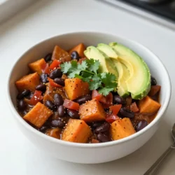 To make Vegan Sweet Potato Black Bean Chili, you need these key ingredients: - 2 medium sweet potatoes, peeled and diced into 1-inch cubes - 1 can (15 oz) black beans, thoroughly drained and rinsed - 1 can (15 oz) diced tomatoes with green chilies - 1 medium onion, finely chopped - 3 cloves garlic, minced - 1 bell pepper (red or green), chopped into bite-sized pieces - 1 tablespoon extra virgin olive oil - 2 cups vegetable broth - 2 teaspoons chili powder - 1 teaspoon ground cumin - 1/2 teaspoon smoked paprika - Salt and freshly ground pepper to taste These ingredients bring a rich and hearty flavor to the chili. The sweet potatoes add sweetness, while the black beans offer protein. The spices, like chili powder and cumin, give it a warm kick. You can also add some optional toppings to enhance your chili: - Fresh cilantro, chopped, for garnish - Slices of ripe avocado, for serving (optional) The cilantro adds freshness, and avocado gives a creamy texture. These toppings make the dish even more enjoyable. {{ingredient_image_2}} 1. Start by heating the extra virgin olive oil in a large pot over medium heat. 2. Once hot, add the finely chopped onion. Saut&eacute; it for about 5 minutes. The onion should soften and turn a bit clear. 3. Next, add the minced garlic and chopped bell pepper. Cook these for another 2-3 minutes until they smell great and feel soft. 4. Now, toss in the diced sweet potatoes. Mix them well with the onion and bell pepper. Ensure they blend together nicely. 5. Sprinkle in the chili powder, ground cumin, smoked paprika, salt, and pepper. Stir the sweet potato mix until every piece gets coated in spices. 6. Pour in the can of diced tomatoes with green chilies, along with the vegetable broth. Bring this mixture to a strong boil. 7. Once boiling, lower the heat and cover the pot. Let the chili simmer for 20-25 minutes. The sweet potatoes should become soft and fork-tender. 8. After the sweet potatoes are tender, stir in the drained black beans. Let the chili cook for another 5 minutes to warm the beans. 9. Taste the chili and adjust the seasoning. Add more salt, pepper, or spices if you want it different. 10. Serve the chili hot. Garnish with fresh cilantro on top. You can add slices of ripe avocado for a creamy touch if you like. This chili is a colorful and tasty dish. It&rsquo;s easy to make and packed with flavor! To make your sweet potatoes perfectly tender, cut them into equal 1-inch cubes. This size helps them cook evenly. Cook them until you can easily pierce them with a fork. For added flavor, use spices like chili powder, cumin, and smoked paprika. These spices bring warmth and depth to your chili. To make your chili visually appealing, ladle it into bright bowls. Sprinkle fresh cilantro on top for a burst of green. If you like, add slices of ripe avocado for creaminess. Serve your chili with crusty bread or tortilla chips for a nice crunch. These sides make the meal even more delightful. Pro Tips Use Fresh Spices: Freshly ground spices can significantly enhance the flavor of your chili. Consider grinding your cumin and chili powder just before cooking for a bolder taste. Adjust the Heat: If you prefer a spicier chili, add chopped jalape&ntilde;os or a dash of cayenne pepper. Start with a small amount and increase to your taste. Texture Variation: For a creamier consistency, you can blend a portion of the chili after cooking. This will create a velvety texture while still having chunky pieces. Make it a Meal: Serve your chili with a side of cornbread or over a bed of cooked quinoa for added protein and a fulfilling meal. {{image_4}} If you want to change things up, consider using butternut squash instead of sweet potatoes. This swap gives a nice sweetness and creamy texture. You can also add greens like spinach or kale for extra nutrients. Toss them in during the last few minutes of cooking. They will wilt nicely and blend in with the chili. To make your chili spicier, try adding diced jalape&ntilde;os or a pinch of cayenne pepper. For a milder dish, reduce the chili powder. If you want to explore different flavors, think about adding smoked chipotle for a smoky taste or a splash of lime juice for tang. These simple tweaks can create a new flavor experience without losing the chili's heartiness. To keep your vegan sweet potato black bean chili fresh, start by letting it cool. Once cool, divide the chili into portions. Use airtight containers for easy storage. Glass or BPA-free plastic containers work well. You can refrigerate the chili for up to five days. For longer storage, freeze it. Place the chili in freezer-safe bags or containers. Label them with the date. This way, you can enjoy it later. When reheating, keep the flavor and texture intact. You can use a pot on the stove or a microwave. If using the stove, add a splash of vegetable broth. This helps maintain moisture. Heat on low to prevent burning. Stir often to heat evenly. If using a microwave, cover the bowl. Heat in short bursts, stirring in between. This helps the chili heat through without drying out. Enjoy your delicious chili just as much the second time! How long can I store Vegan Sweet Potato Black Bean Chili? You can store this chili in the fridge for up to 5 days. Make sure to place it in an airtight container. If you want to keep it longer, freeze it. It will last for about 3 months in the freezer. Can I make this chili in a slow cooker? Yes, you can make this chili in a slow cooker. Start by saut&eacute;ing the onion and garlic in a pan. Then, add all ingredients to the slow cooker. Cook on low for 6 hours or high for 3 hours. Is this chili gluten-free? Yes, this chili is gluten-free. All the ingredients are safe for a gluten-free diet. Make sure to check any canned products to ensure they are labeled gluten-free. What can I serve with this chili? You can serve this chili with crusty bread, tortilla chips, or over rice. For a fresh touch, add slices of avocado or a sprinkle of cilantro on top. How do I adjust the recipe for a larger batch? To make a larger batch, simply double all the ingredients. Use a larger pot and adjust the cooking time if needed. Make sure to taste and tweak the seasonings as you go. This vegan sweet potato black bean chili is both hearty and simple to make. We covered the key ingredients, from sweet potatoes to black beans, and discussed optional toppings like avocado. I outlined step-by-step preparation to ensure you achieve great flavor and texture. Remember, you can customize it with different spices or greens. Store any leftovers properly and enjoy them later. This chili is flexible, so feel free to make it your own. Try it out, and enjoy cozy meals that warm your heart.